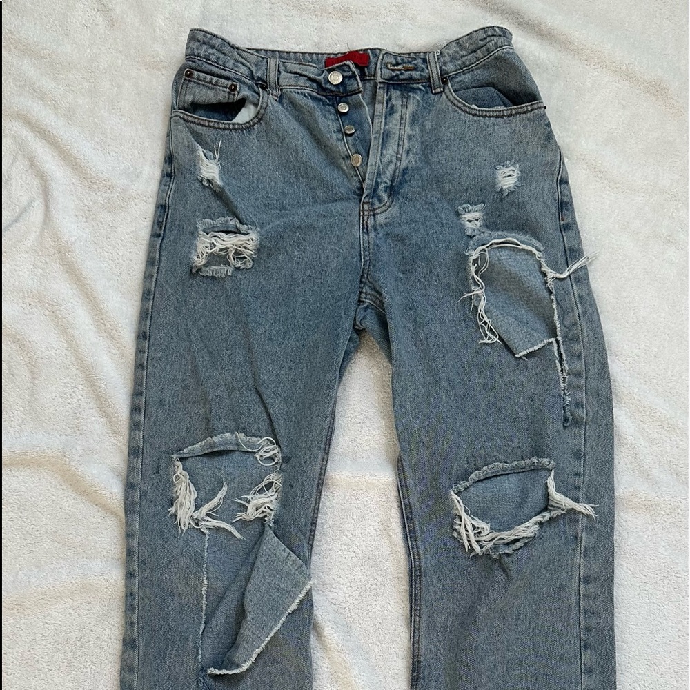 Distressed signature jeans